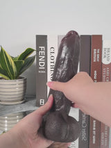 Ryder 10.8" x 2.6" Realistic Veined Sliding Skin Black Dildo with Vac-U-Lock Connector